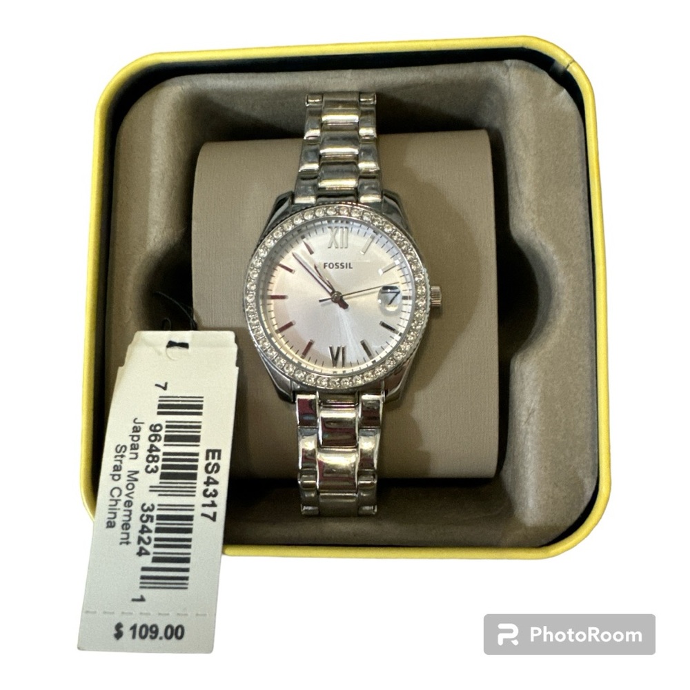FOSSIL Watch with rhinestones around it.